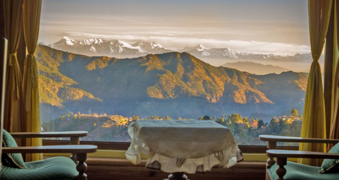 Enjoy the views of snow laden peaks of the Himalayas just by sitting in your room